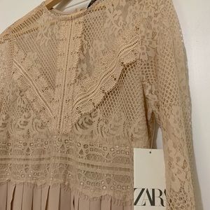 Dress by Zara, never used. It was 39.95 Euros.